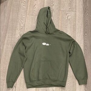 Green Hoodie with cooking icons. NEVER WORN. ANY GENDER